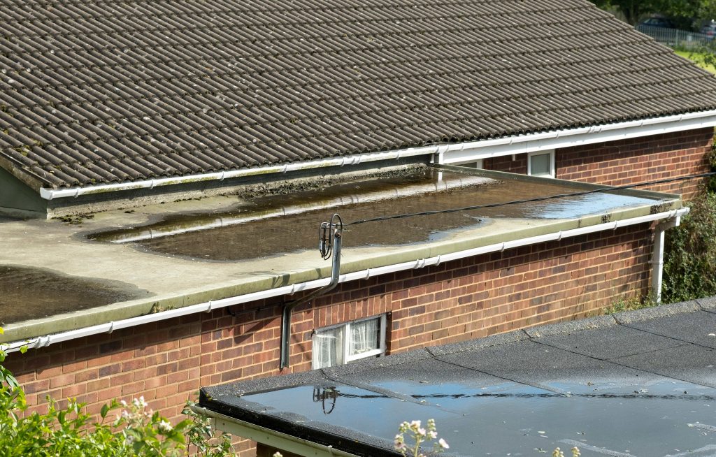 system failures with flat roofs